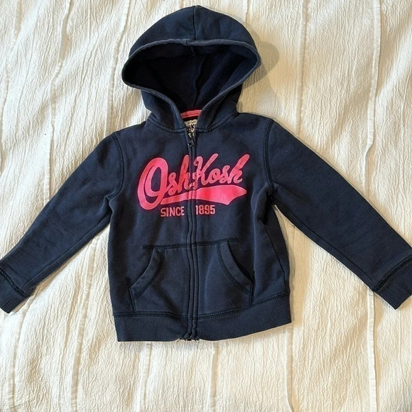 OshKosh B'gosh - Navy full zipped hoodie with pink/sparkle (slight) logo. Size 4 - Picture 1 of 4